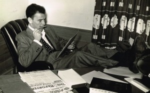 Frank Sinatra at desk, c. 1950