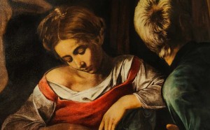 La Natività con i Santi Lorenzo e Francesco d'Assisi, dipinta da Caravaggio