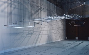 Nadia Kaabi-Linke, Flying Carpets, 2011. Stainless steel and rubber, 420 cm x 13 m x 340 cm, edition 2/2 (First edition commissioned by the Abraaj Group Art Prize). Solomon R. Guggenheim Museum, New York, Guggenheim UBS MAP Purchase Fund 2015.92 - Nadia Kaabi-Linke. Installation view: The Abraaj Group Art Prize, Madinat Jumeirah, Dubai, March 16-19, 2011. Photo: Thomas Brown (PRNewsFoto/Solomon R. Guggenheim Museum)