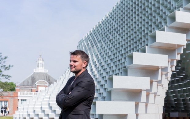 Architect Bjarke Ingels in front of the Serpentine Pavilion 2016 designed by Bjarke Ingels Group (BIG) Photo © Iwan Baan