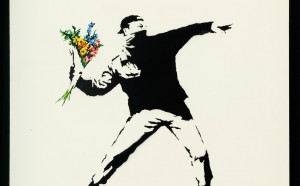 Banksy, Love is in the air (flower trower), 2003. Photo by Dario Lasagni