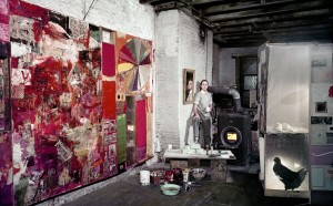 Rauschenberg in his Pearl Street studio, New York, March 1958. Works, left to right: Charlene (1954), Untitled (c. 1954), and a partial rear view of the second state of Monogram (1955–59, second state 1956–58). Photographer: Dan Budnik. Courtesy Robert Rauschenberg Foundation Archives, New York. © Dan Budnik, all rights reserved