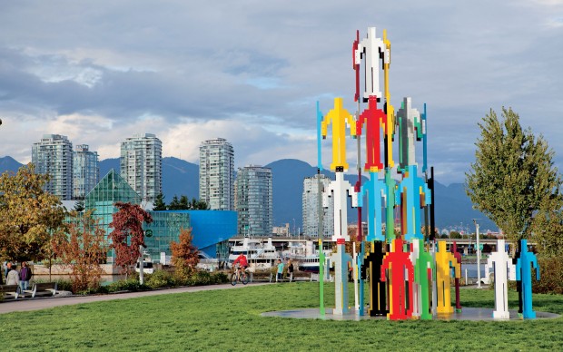 Jonathan Borofsky (born in 1942), Human Structures Vancouver, 2010, 64 moulded, welded and painted galvanized steel figures, concrete base, 730 x 510 x 510 cm. Vancouver Biennale loan, in collaboration with the McGill University Visual Arts Collection. Photo GoToVan