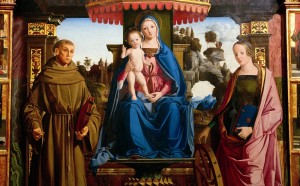 Marco Palmezzano (Forlì 1459 circa - 1539) Madonna in trono tra i santi Francesco e Caterina d’Alessandria, 1501. Olio e oro su tavola, Matelica (Macerata), chiesa di San Francesco