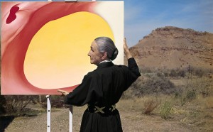 Tony Vaccaro, Georgia O'Keefe with "Pelvis Series, Red with Yellow" and the desert, 1960. Georgia O'Keeffe Museum. Courtesy of Tony Vaccaro studio.