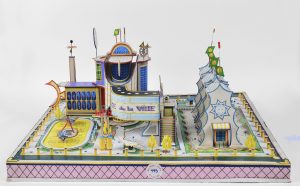 Bodys Isek Kingelez, Congolese, 1948–2015 Place de la Ville 1993 Paper, paperboard, plastic, and other various materials 15 3/4 × 33 7/16 × 29 1/2" (40 × 85 × 75 cm) Courtesy The Museum of Everything On Loan (Incoming)