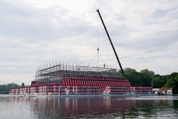 The London Mastaba - Barrels being installed on the slanted wall of the London Mastaba, May 2018. Photo: Wolfgang Volz
