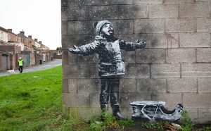 Banksy Murale Port Talbot bambino nevicata