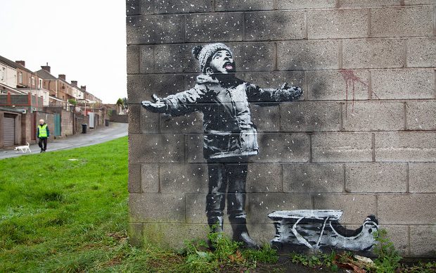 Banksy Murale Port Talbot bambino nevicata