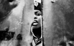 MALAWI. Blantyre. May 27th, 2015. Chichiri Prison. A prison guard closes the prison's main gate as she shouts to detained's relatives [not pictured] that the parental visit time is over. © Luca Sola 2015