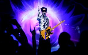 LOS ANGELES, CA - MARCH 28: ***EXCLUSIVE*** Musician Prince performs his first of three shows onstage during "One Night... Three Venues" hosted by Prince and Lotusflow3r.com held at NOKIA Theatre L.A. LIVE on March 28, 2009 in Los Angeles, California. (Photo by Kristian Dowling/Getty Images for Lotusflow3r.com)