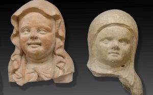 Teste di statue votive in terracotta di bambini in fasce da Vulci, deposito votivo di Porta Nord IV-III sec. a.C.