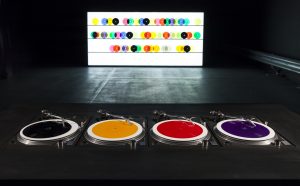 Carsten Nicolai, bausatz noto ∞ (color version), 1998/2015, record player, color vinyl records with locked grooves, mixing board, amplifier, loudspeaker/ headphones, dimension variable, © VG Bild-Kunst, Bonn 2019, Courtesy Galerie EIGEN + ART Leipzig/Berlin, photo: Julija Stankeviciene