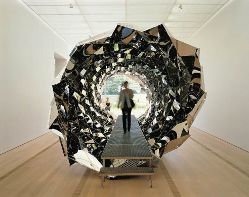 Olafur Eliasson (b.1967), Your spiral view, 2002, stainless steel, mirror, steel, 3200 x 3200 x 8000 mm. Installation view at Fondation Beyeler, Basel, Switzerland, 2002. Photographer: Jens Ziehe Boros Collection, Berlin © 2002 Olafur Eliasson