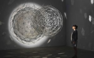 Olafur Eliasson (b.1967), Stardust particle 2014 Stainless steel, translucent mirror-filter glass, wire, motor, spotlight Ø 1760 mm Tate Photo: Jens Ziehe, 2017 © 2014 Olafur Eliasson