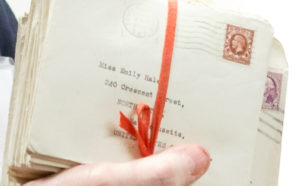 An envelope in a bundle tied with ribbon addressed to Emily Hale at her address in Massachusetts. Photo by Shelley Szwast, courtesy of Princeton University Library