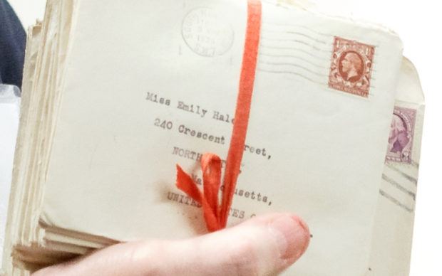An envelope in a bundle tied with ribbon addressed to Emily Hale at her address in Massachusetts. Photo by Shelley Szwast, courtesy of Princeton University Library