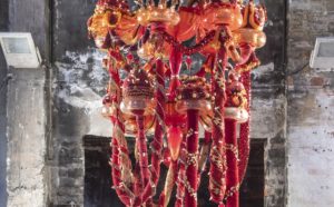 Joana Vasconcelos, Rubra, 2016; Murano glass, wool yarn, ornaments, LED lighting, polyester, and iron, 69 1/4 x 43 in. diameter; National Museum of Women in the Arts, Gift of Christine Suppes; Photo by Francesco Allegretto