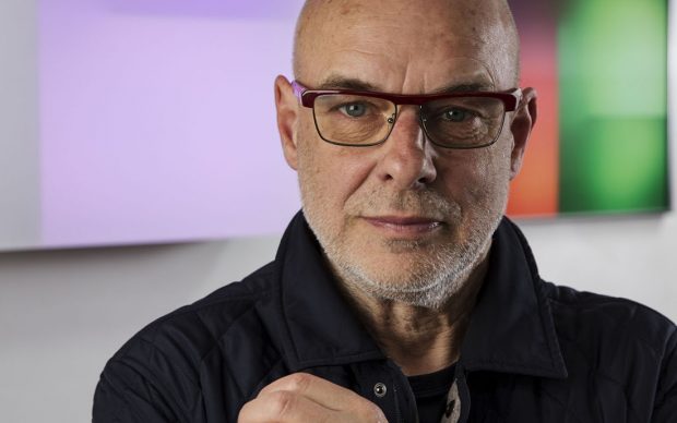 Brian Eno, musician and artist in his studio with lightbox and lenticular. April 2016
