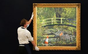 Banksy, Show me the Monet, 2005, oil on canvas, 143.1 x 143.4 cm. Estimate £3-5 million. Photo by Michael Bowles/Getty Images for Sotheby's. Copyright Sotheby's