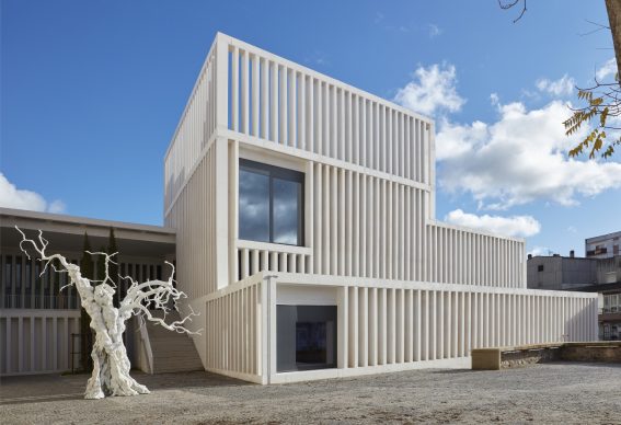 Exterior of the Museum of Contemporary Art Helga de Alvear, with A Day Like This Made of Nothing and Nothing Else, 2009, Ugo Rondinone. Photo: Joaquín Cortés