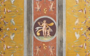 Giulio Romano e allievi, Venere allo specchio e Amore. Volta del Camerino di Venere, 1527. Affresco, Mantova, Palazzo Te. Foto Gian Maria Pontiroli © Fondazione Palazzo Te